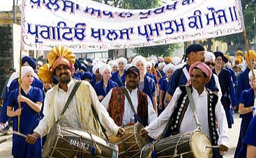 Dhol Drummers in the lead of the procession
