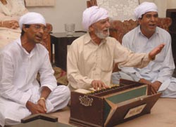 Bhai Mardana’s descendant Ghulam Mohammad Chaand (C) performs kirtan in Amritsar. 