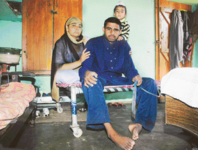 Bharpur Singh with his family in his one-room tenement at Chak Kalan village, near Mullanpur, in Ludhiana.