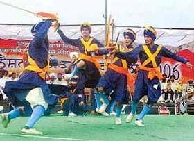 Participants display their skills on the final day of the First National Gatka Competition in front of Gurdwara Sant Mandal Adiha Sahib, Lambian
